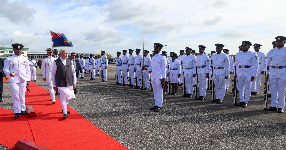 PM receives a Guard of Honour upon his arrival at Port of Spain